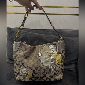 Coach Tan and Gold Floral Shoulder Bag WITH A FEW STAINS AROUND THE FLOWERS